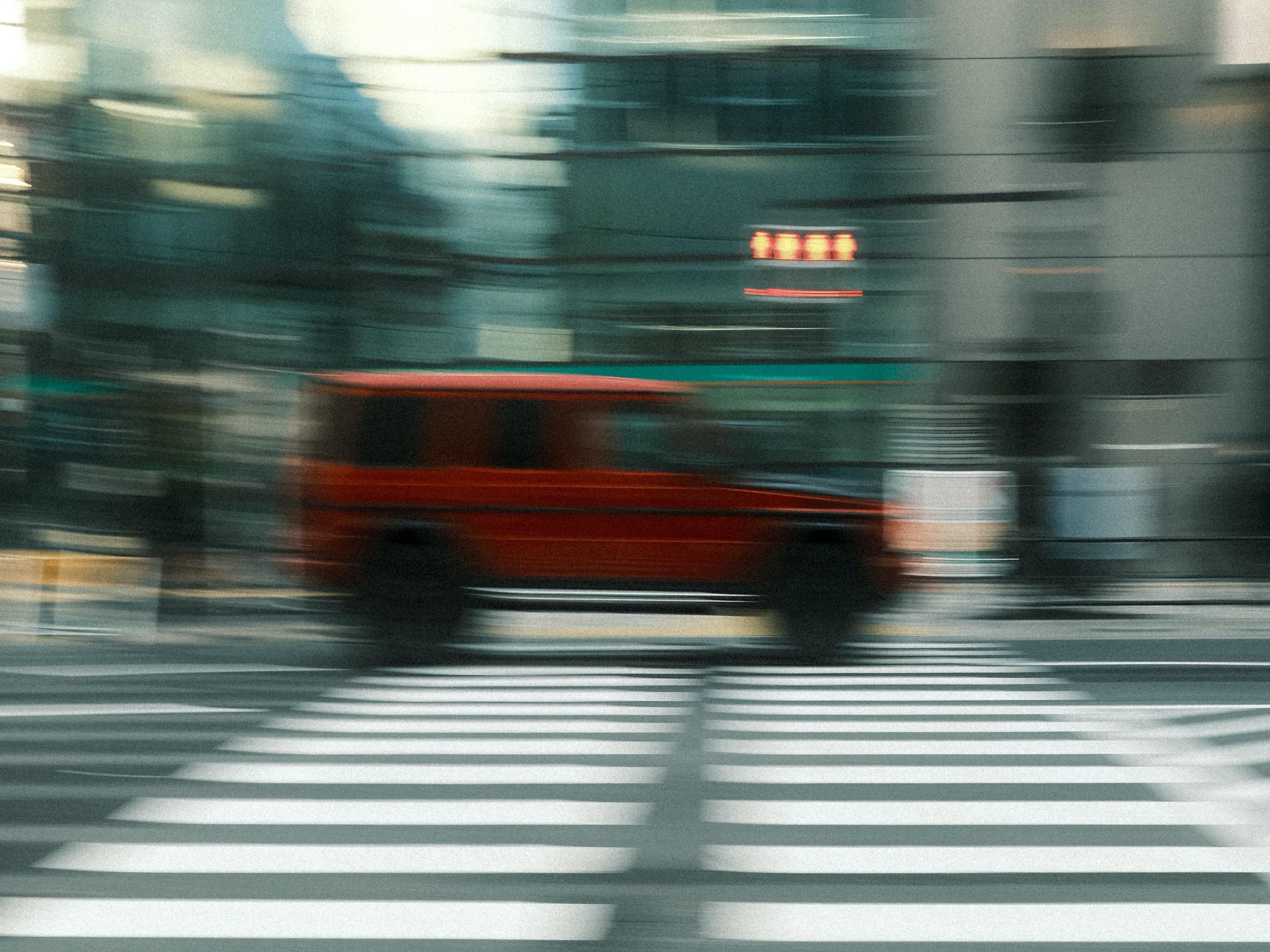 Car moving really fast to represent speed for websites